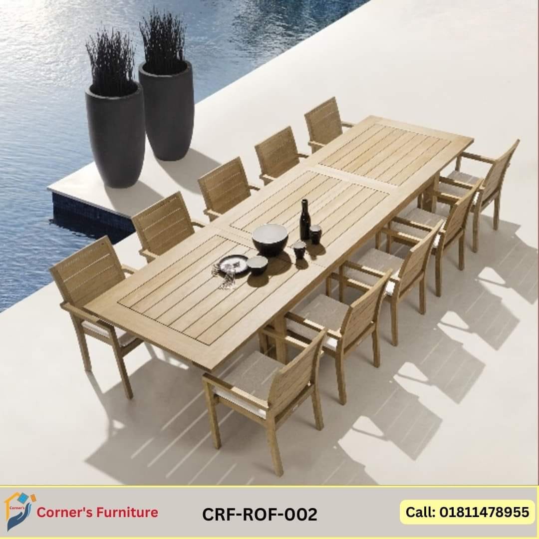 Outdoor table The leg and base are made of heat painted MS bar. The top is made of weather resistant composite wood.